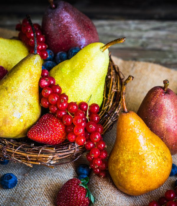 Pears with berries on wooden background Pears with berries on wooden background